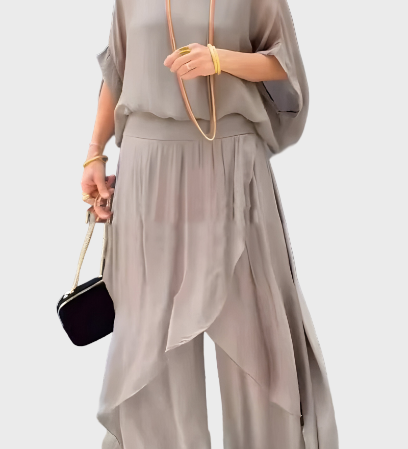 Plačios viršutinės dalies ir suplėšytos kelnės – dviejų dalių sijonas iš šifono