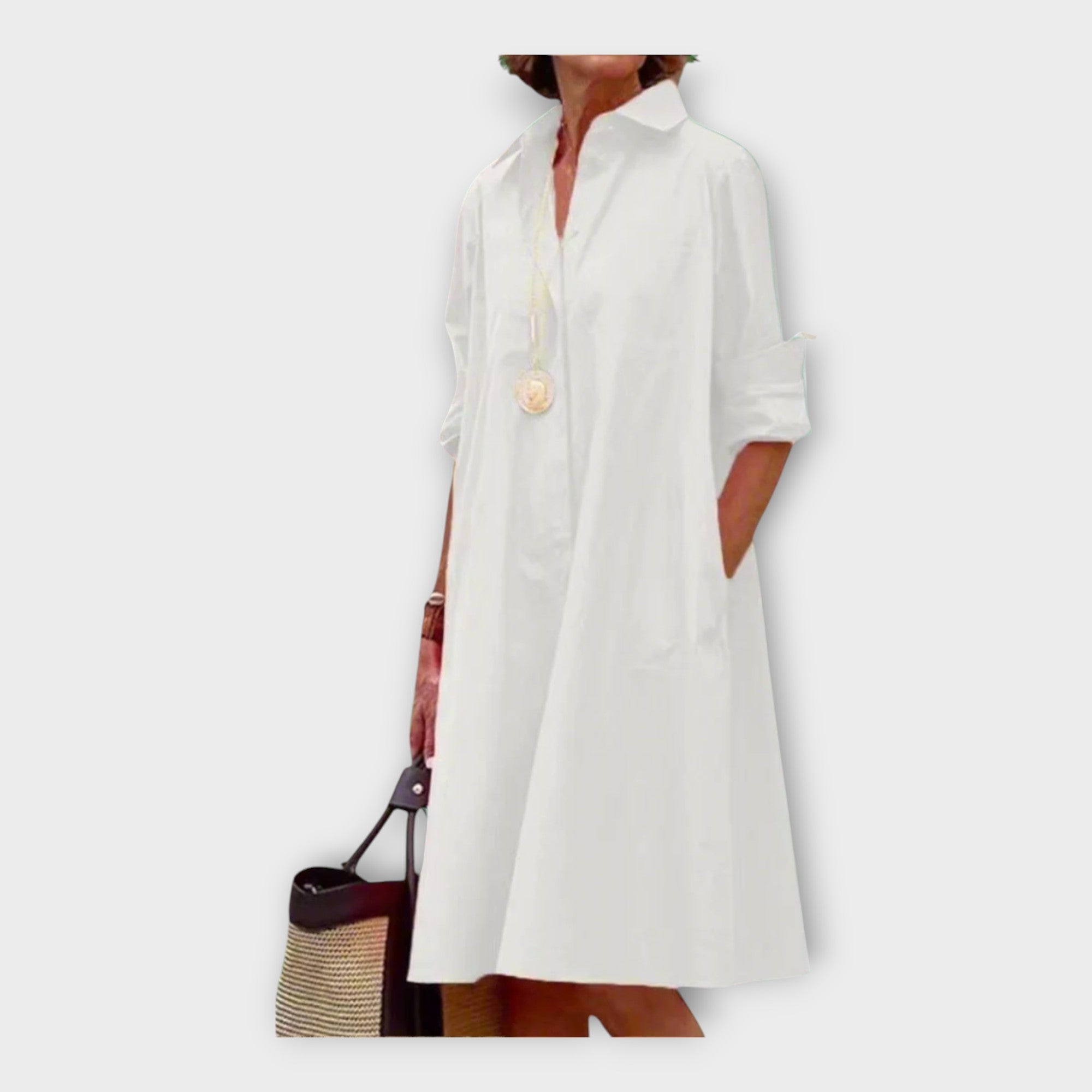 Rankų darbo suknelė su geometriniu raštu